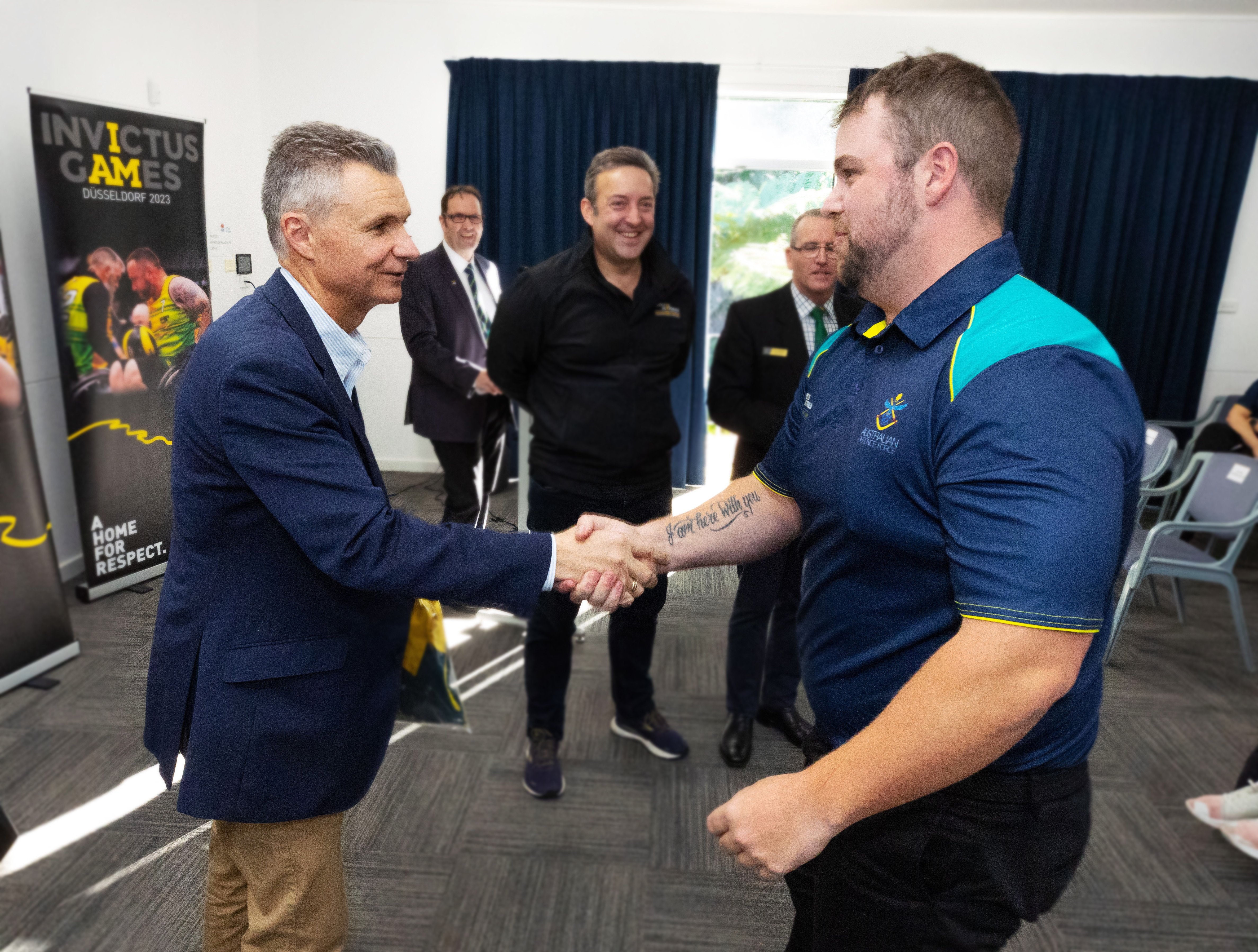 Assistant Minister for Defence, Assistant Minister for Veterans Affairs, Assistant Minister for the Republic, The Honourable Matt Thistlethwaite MP congratulates Team Australia competitor Stephen Lockwood during the announcement of the co-captains of Team Australia for Invictus Games Dusseldorf 2023 at the Sydney Academy of Sports and Recreation, Narabeen, Sydney. *** Local Caption *** Flight Sergeant Nathan King and Able Seaman Taryn Dickens have been announced as the co-captains of Team Australia for Invictus Games Dusseldorf 2023.
