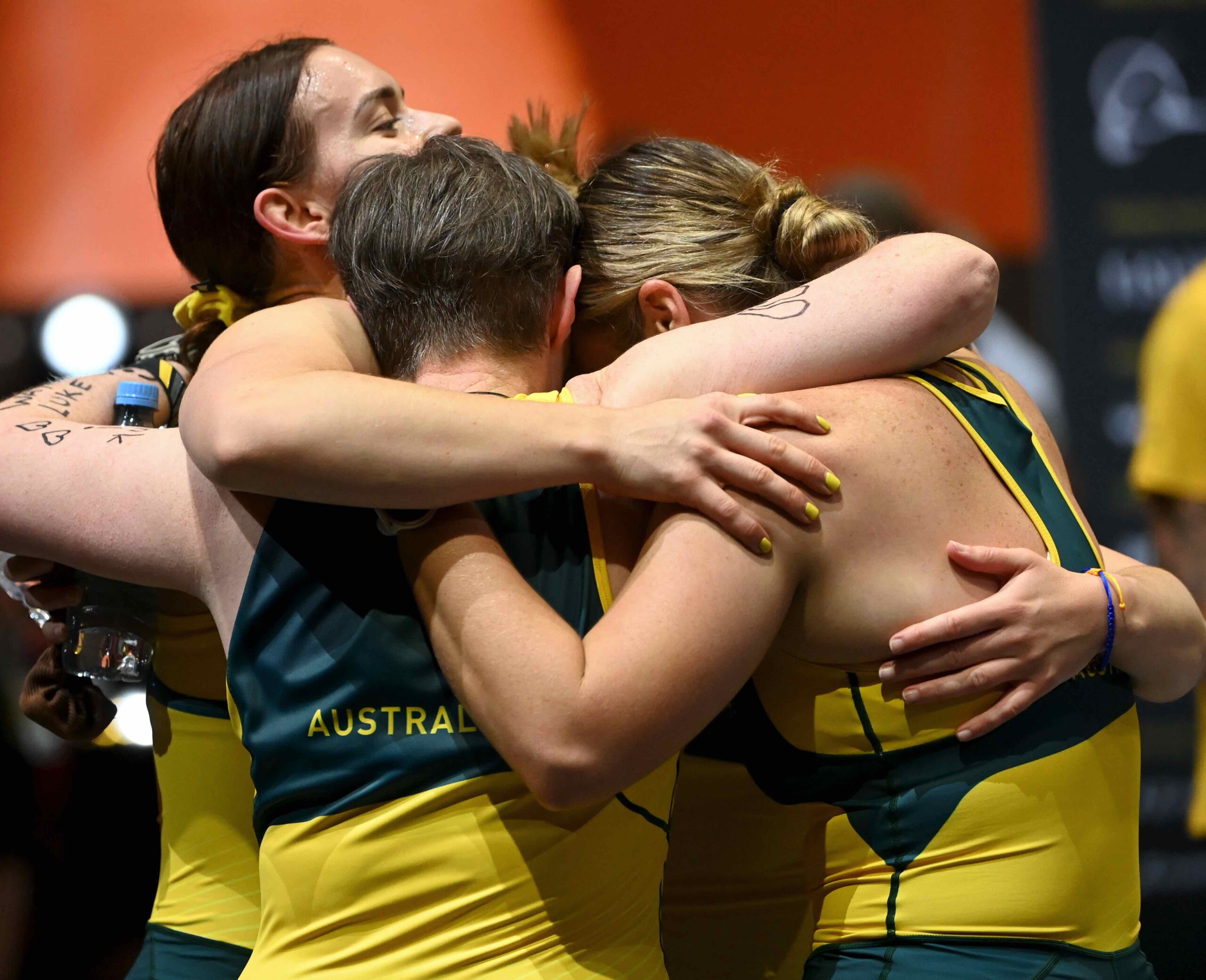 Team Australia embrace at the indoor rowing at at Invictus Games Dusseldorf 2023