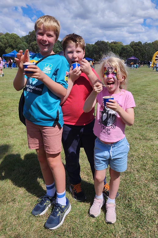 Children enjoying NEC ice-cream at the Canberra Defence Day