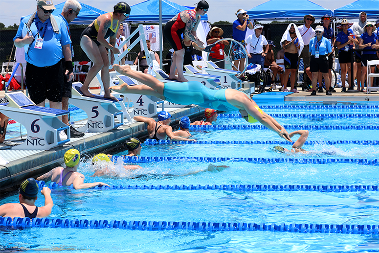 Erin Brigden dives into the pool at the 2024 Warrior Games