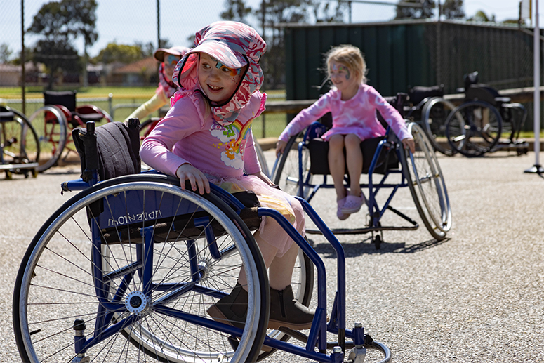 Young girls playing wheelchair sports at Invictus Australia Defence Community Sport Expo